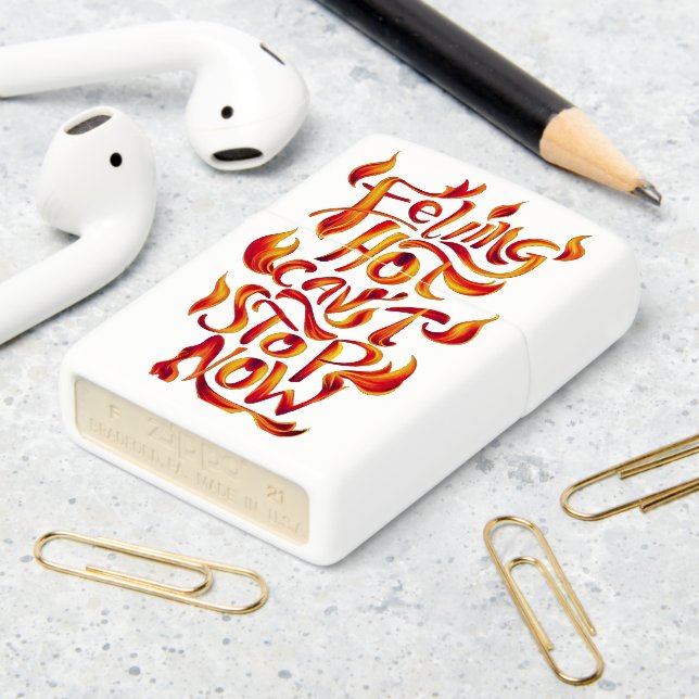Feeling Hot, Cant Stop Now Zippo Lighter (On Table 2)