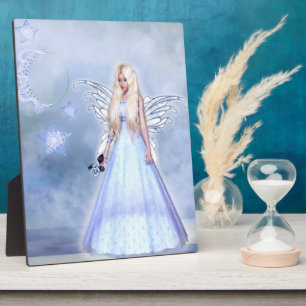 Female angel in blue plaque