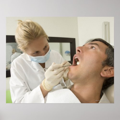 Female dentist examining man poster