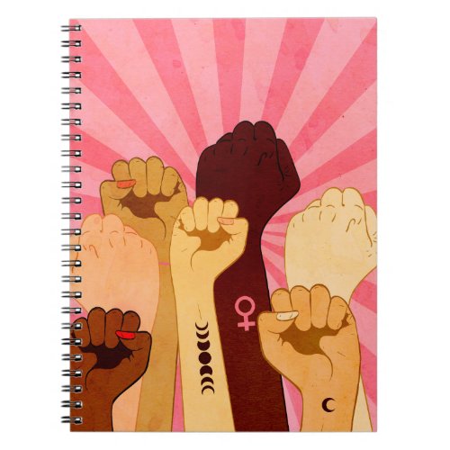 Female hands with fist raised up notebook