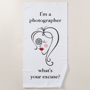 Female photographer beach towel