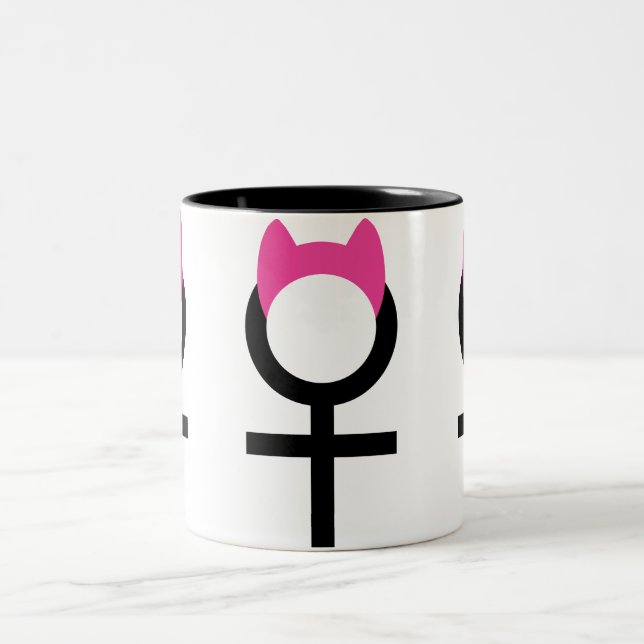Female Symbol with Pussyhat by Cafe Cha Cha Two-Tone Coffee Mug (Center)