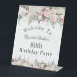 Feminine Pink Rose Floral 80th Birthday Welcome Pedestal Sign<br><div class="desc">A lovely floral welcome pedestal sign designed especially for a birthday party, this sign has text you can personalize in the center section and is bordered by beautiful pink and white watercolor florals with trailing greenery. Shown here as an 80th birthday party, you can edit the age to any age....</div>