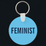 Feminist, bold navy text on sky blue keychain<br><div class="desc">Bold custom keychain reads: "feminist" in bold navy blue text on a sky blue background. For a different background color, click "Customize it" and select a background color in the sidebar. Click "Done" and then "Add to cart" to purchase your customized keychain. To see the design Feminist on other items,...</div>