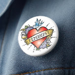 Feminist Button<br><div class="desc">Feminist Button - This ultra cool pinback button features a realistic tattoo heart with a vintage style banner and the word Feminist. An awesome gift idea for young women finding their way. Style up,  seize the day and show who's in charge with this very cool feminist button.</div>