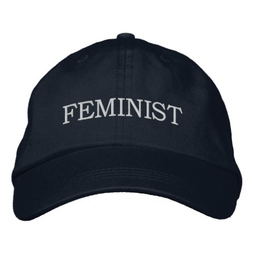 Feminist white text on navy blue embroidered baseball cap