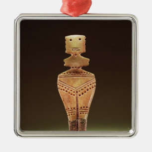 Fertility figure metal ornament