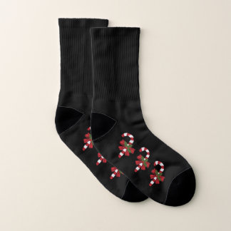 Festive Christmas Candy Canes On Black Socks