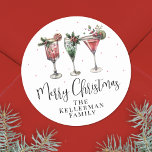 Festive Cocktails Merry Christmas Classic Round Sticker<br><div class="desc">Add a festive flair to your holiday season with this cheerful round sticker featuring a colorful watercolor cocktail design. A mix of red and green holiday drinks sits at the top, bringing a lively and celebratory vibe. In the center, “Merry Christmas” is written in elegant script, while the bottom includes...</div>