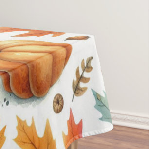 Festive Fall Pumpkins and Leaves on White Tablecloth