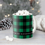 Festive Green Buffalo Plaid Custom Family Monogram Coffee Mug<br><div class="desc">Personalize this festive Christmas coffee or hot cocoa mug with your family name or other custom text.  Design features a festive and stylish modern black and green buffalo check plaid pattern with heart accent.</div>