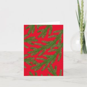 Festive Green Fir Tree Branches on Red Card