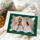Festive Green Retro Photo Frame Merry Christmas Holiday Card<br><div class="desc">Send festive holiday greetings to your friends and family with this trendy holiday photo card! The simple Christmas card displays your horizontal photo framed in a wavy, dark green retro-style frame. Personalize the minimal holiday card with a custom greeting (shown as Merry Christmas) and your family name in white lettering....</div>