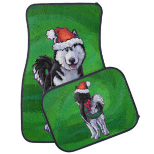 Festive Husky in Santa Hat on Green Car Mat