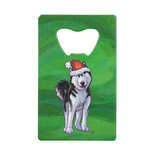 Festive Husky in Santa Hat on Green Credit Card Bottle Opener