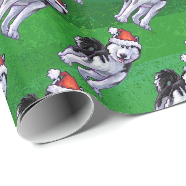Festive Husky in Santa Hat on Green Wrapping Paper (Roll Corner)