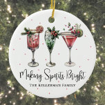 Festive Making Spirits Bright Christmas Ceramic Ornament<br><div class="desc">Add a festive touch to your tree or holiday gifting with this round Christmas ornament featuring a cheerful watercolor cocktail design. A lively mix of red and green holiday drinks decorates the top, setting a fun and spirited tone for the season. Below the artwork, “Making Spirits Bright” is written in...</div>
