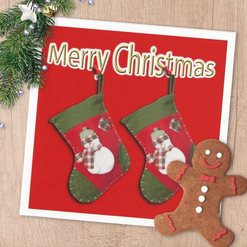 Festive Merry Christmas Snowman Stocking Over Red Paper Napkins