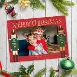 Festive Nutcracker Christmas Photo Red Gold Foil Holiday Card<br><div class="desc">This festive holiday photo card features a horizontal photo on a festive red background with two nutcrackers on each side standing guard, and the greeting "Merriest Christmas". The nutcrackers are dressed in dark green and dark brown and accented with gold foil. The greeting and your name are also in gold...</div>
