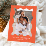 Festive Orange Retro Photo Frame Merry Christmas Holiday Card<br><div class="desc">Send festive holiday greetings to your friends and family with this trendy holiday photo card! The simple Christmas card displays your vertical photo framed in a wavy, orange retro-style frame. Personalize the minimal holiday card with a custom greeting (shown as Merry Christmas) and your family name in white lettering. The...</div>