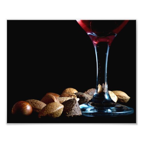 Festive photograph of a wine glass and nuts