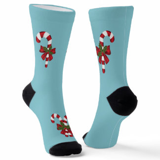 Festive Red And White Candy Canes On Light Blue Socks