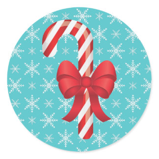 Festive Red Christmas Candy Cane With A Bow Blue Classic Round Sticker