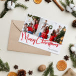 Festive Red Script Merry Christmas Six Photo Holiday Card<br><div class="desc">Celebrate the season with this festive red script Merry Christmas six photo holiday card featuring a touch of elegant charm. The chic design showcases a simple red-and-white color palette, evoking the cozy spirit of winter. Its modern and unique appeal and rustic wording create a perfect balance between seasonal and contemporary....</div>