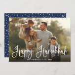 Festive Script Overlay Hanukkah Photo Holiday Card<br><div class="desc">Simple and chic Hanukkah photo card features your favorite family photo overlaid with "Happy Hanukkah" in white modern script lettering. Personalize with your family name and the year along the bottom. Cards reverse to a snow and stars pattern in rich navy blue and white.</div>