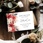 Festive Winter Christmas Florals Wedding Save The Date<br><div class="desc">Elegant wedding save the date cards featuring winter florals - poinsettias,  in rich shades of red,  burgundy,  creams and ivory,  festive berries and lush greenery The simple save the date template is combined with a combination of calligraphy script handwriting and serif fonts.</div>