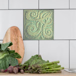 Fiddlehead fern Green Ceramic Tile<br><div class="desc">This Arts and Crafts style tile features a foliage design called Fiddlehead fern by the creator. The complex glaze is what makes this tile so lovely This tile is designed for Kitchen backsplashes, Bathrooms or fireplaces. The tiles can be arranged in a row, a group or with other plain tiles....</div>