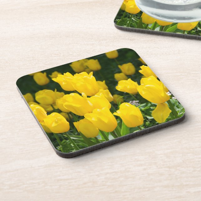 Field of bright yellow tulips beverage coaster (Left Side)