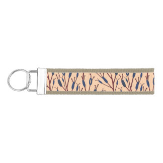 Field of Cat Tails against a Peach Background Wrist Keychain