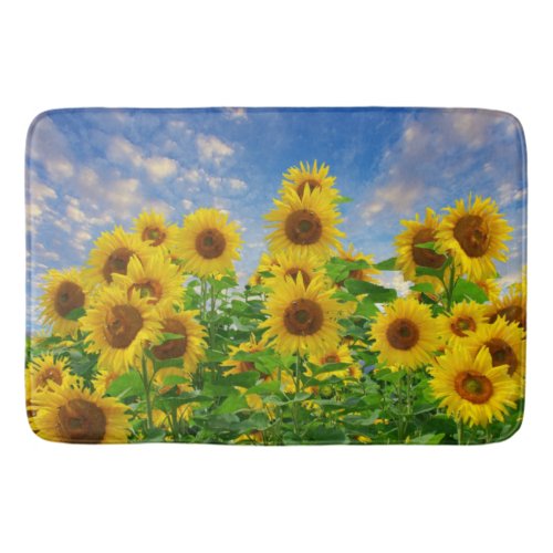 Field of Sunflowers Against Blue Sky with Clouds B Bath Mat