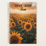 Field Sunflowers Sun Setting View  Planner<br><div class="desc">Golden Horizon” Calendar Planner Bask in the brilliance of every day with this nature-inspired calendar planner, featuring a field of blooming sunflowers drenched in sunset gold. The luminous sky, painted in soft amber and dramatic cloud textures, sets the tone for reflection, creativity, and seasonal beauty. Perfect for those who crave...</div>