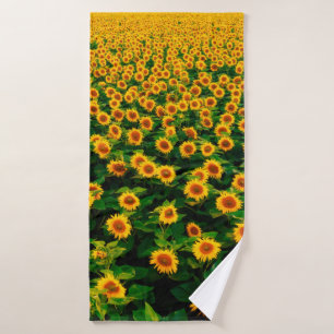 Field with bright yellow sunflowers in sunny day. bath towel