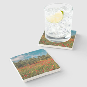 field with flowers and trees stone coaster