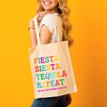 Fiesta Siesta Tequila Repeat Bachelorette Tote Bag<br><div class="desc">Looking for the perfect bachelorette party gift? Look no further than this stylish and fun tote bag! Featuring the catchy slogan "Fiesta Siesta Tequila Repeat, " this tote bag is the perfect accessory for any bachelorette party. Whether you're hitting the town for a night of dancing and fun or lounging...</div>