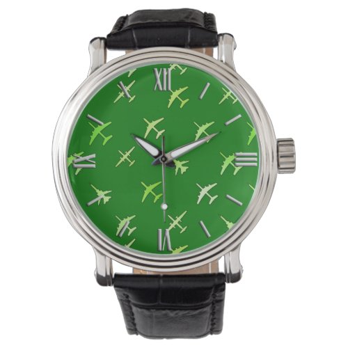 Fighter planes on forest green watch