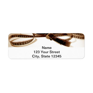 Film Reel in Sepia Tones Background Label