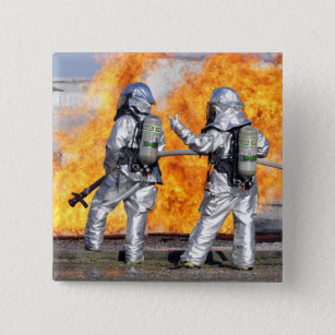 Firefighters battle a simulated fire pinback button