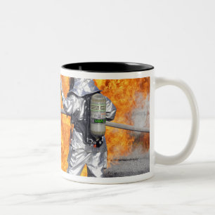 Firefighters battle a simulated fire Two-Tone coffee mug