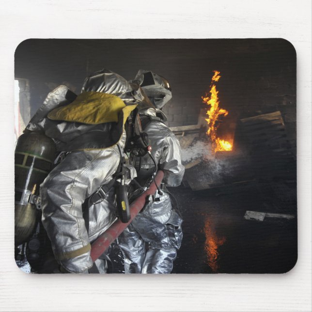 Firefighters extinguish a fire in a training ro mouse pad (Front)