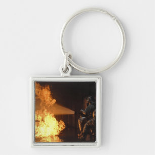 Firefighters extinguish a simulated battery fir keychain