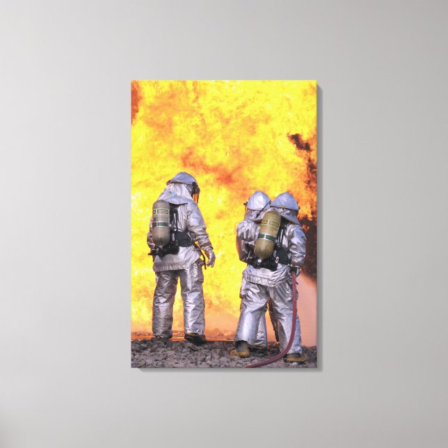 Firefighters extinguish an aircraft fire canvas print (Front)