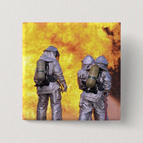 Firefighters extinguish an aircraft fire pinback button