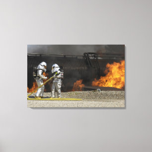 Firefighters neutralize a live fire canvas print