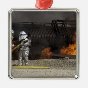 Firefighters neutralize a live fire metal ornament