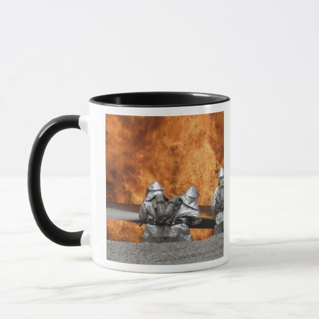 Firemen neutralize a fire mug (Left)