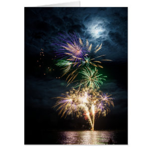 Fireworks under the moon over the ocean card